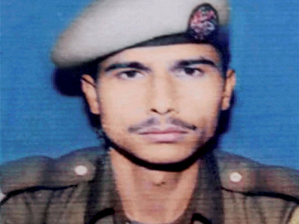 File picture of Braveheart Cop of Jammu & Kashmir Police Constable Manzoor Ahmed who laid down his life while fighting militants at Tral in the outskirts of Srinagar city on Sunday morning. PTI Photo