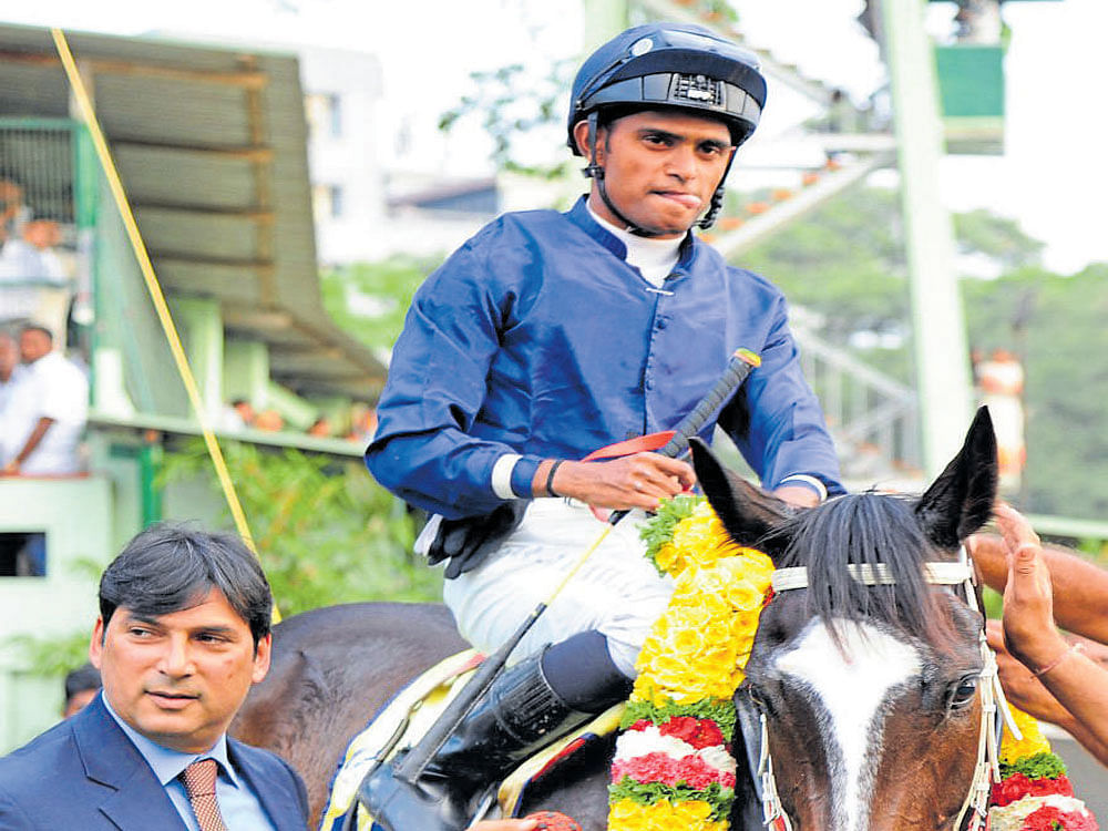 winning combo Trainer Pesi Shroff leads in Temerity with Neeraj Rawal astride after the filly won the Indian Turf Invitation Cup. dh photo/ srikanta sharma r