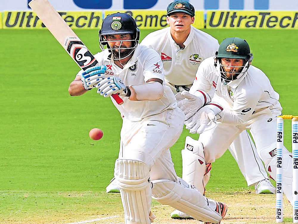Cheteshwar Pujara hit an unbeaten 79 as Indian batsmen prospered at last. DH PHOTO/ srikanta sharma r
