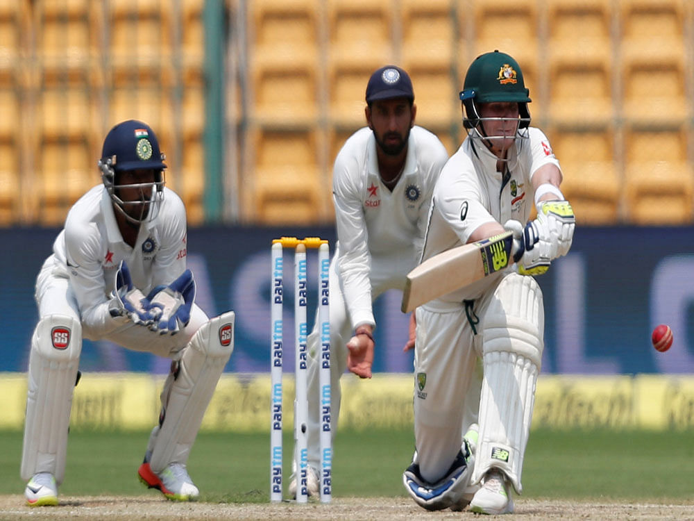 India v Australia - Second Test cricket match - M Chinnaswamy Stadium, Bengaluru, India - 07/03/17 - Australia's captain Steven Smith plays a shot. REUTERS