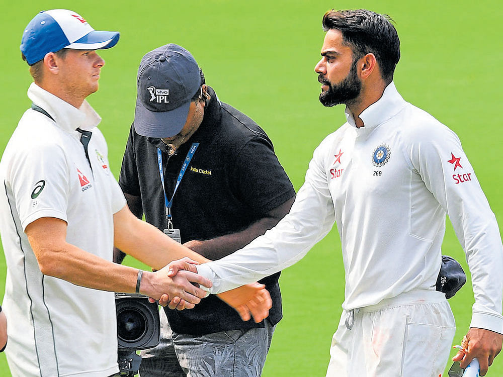 tensions on rise: There was no love lost between Steve Smith and Virat Kohli in the second Test. dh photo/ srikanta sharma r