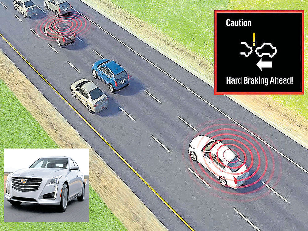 the wheel connect: A rendering from Cadillac of an alert that a driver would see in a car using vehicle-to-vehicle communications. Starting in March, the 2017 Cadillac CTS (inset) will offer short-range communication between cars up to 1,000 feet apart. Cadillac via nyt
