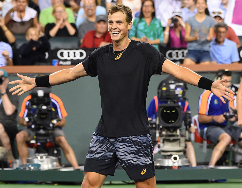Can't believe it: Canada's Vasek Pospisil celebrates his win over Andy Murray. Reuters