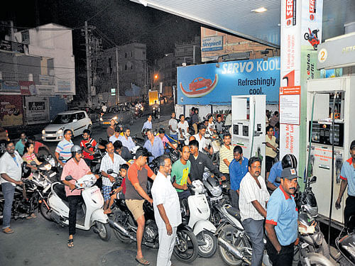 Fuel prices may be cut tomorrow. DH file photo