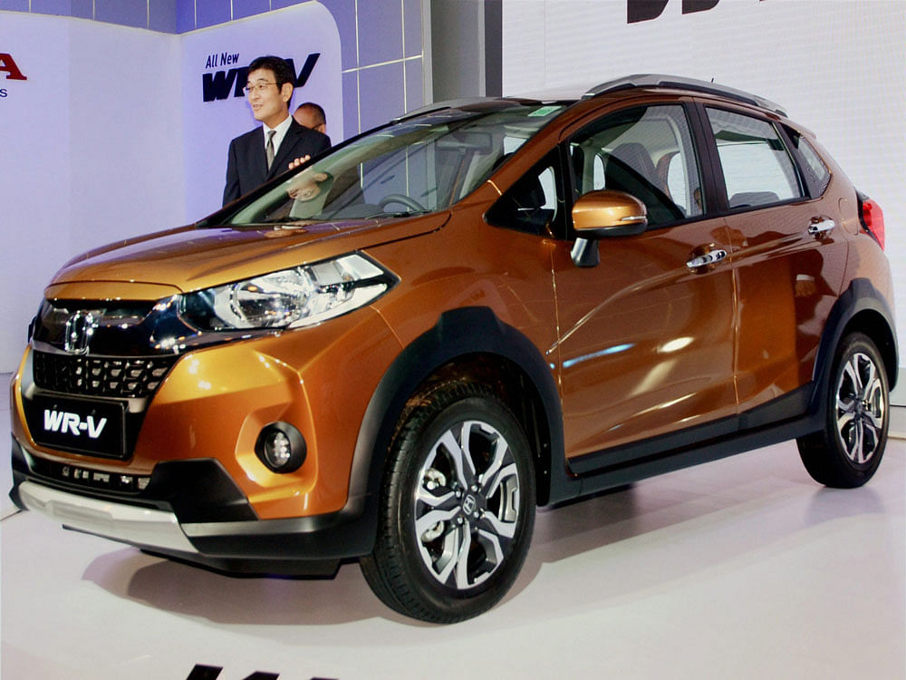Yoichiro Ueno, Chief Executive and President of Honda Cars India Ltd during the launch of WR-V car in New Delhi on Thursday. PTI Photo