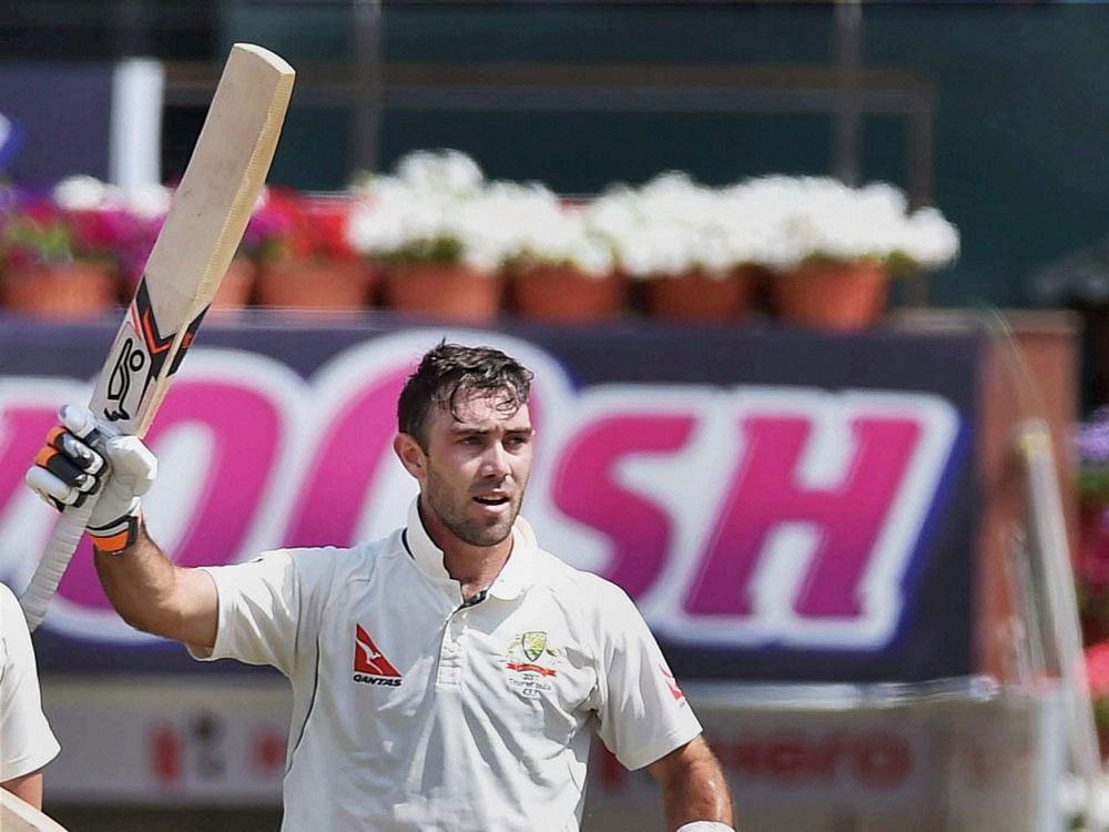 Australian batsman Glenn Maxwell reacts after complete his century during 2nd day of 3rd Test against India in Ranchi on Friday. PTI Photo