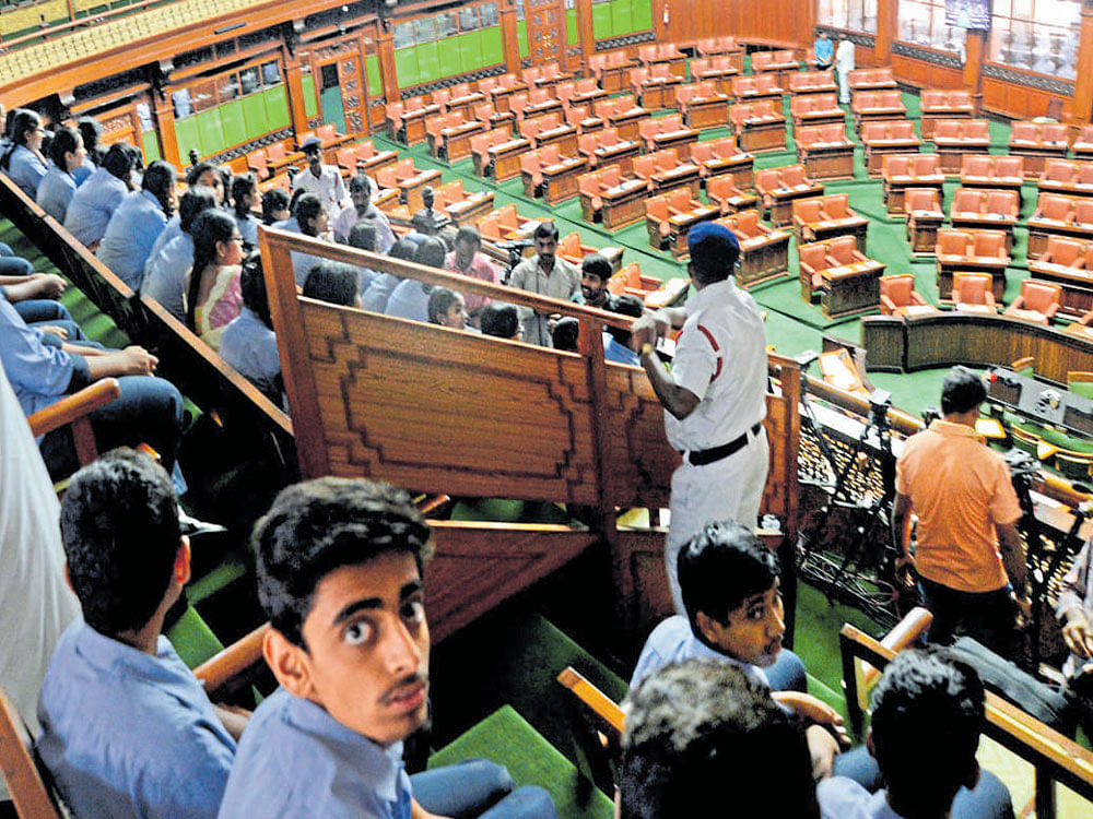 Schoolchildren, who came to witness the Assembly session in the Vidhana Soudha on Friday, were in for a disappointment as it was adjourned  following a protest by BJP MLAs. DH Photo