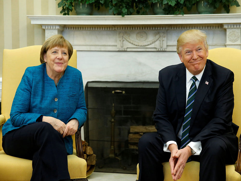 Merkel maintained her composure even when Trump repeated his contention that former President Barack Obama may have tapped his phones in Trump Tower. Reuters Photo