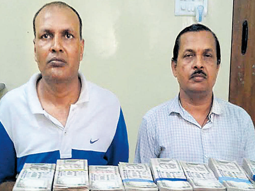 Anand jain and Vinaya Prasad, who were arrested by the CCB in Langford Town in Bengaluru on Friday night.