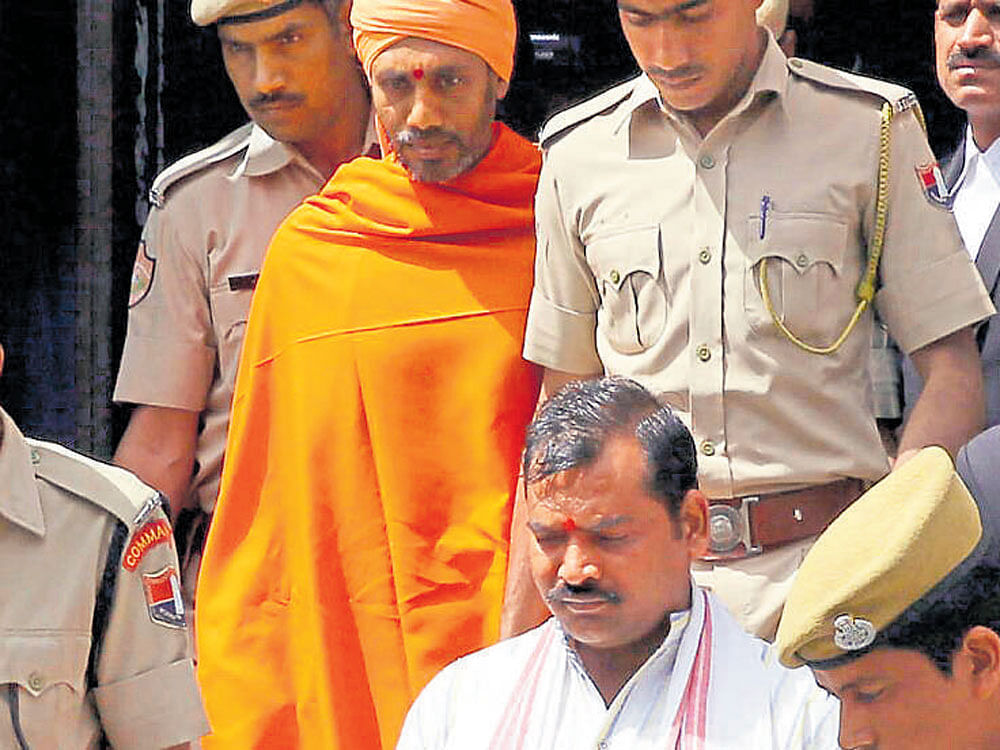 Convicts Bhavesh Patel and Devendra Gupta being brought out of a Jaipur court on Saturday. dh photo/ tabeenah Anjum
