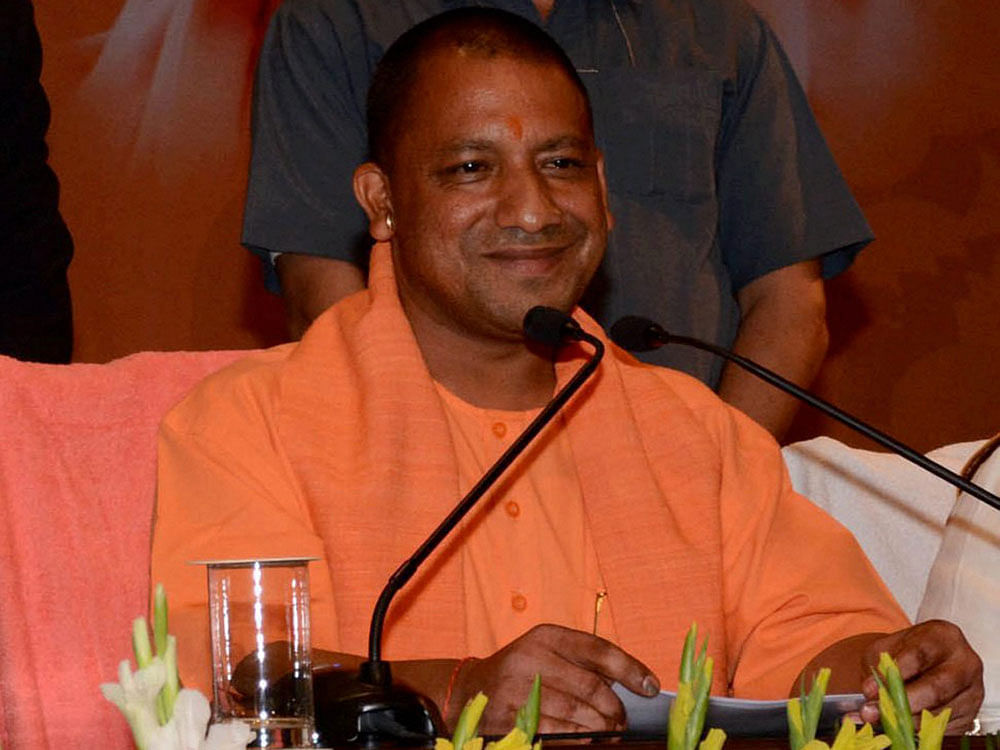 Uttar Pradesh Chief Minister Yogi Adityanath addressing a press conference in Lucknow on Sunday. PTI Photo