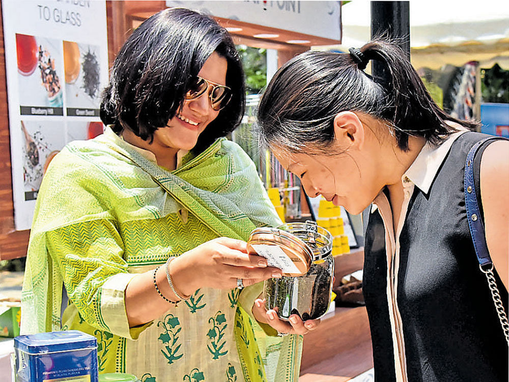AROMATIC Visitors at the Tea Festival. DH PHOTO
