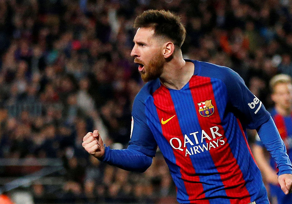 Barcelona's Lionel Messi celebrates his second goal. REUTERS