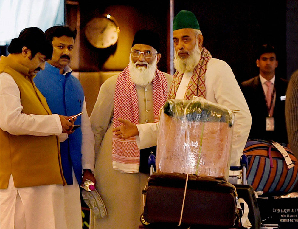 Indian clerics, Syed Asif Nizami, the head priest of Hazrat Nizamuddin Aulia Dargah, and his nephew Nazim Ali Nizami, who went missing in Pakistan last week, arrived at the IGI Airport in New Delhi on Monday. PTI Photo