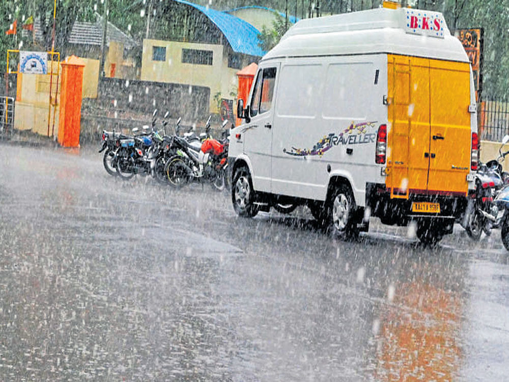 Rain lashed Belur town in Hassan district on Tuesday  afternoon. dh photo