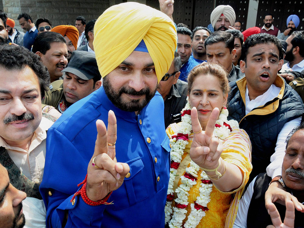 Amarinder said in case Sidhu's work on TV was as per law, he may have to divest him of the culture portfolio lest it should involve a conflict of interest. PTI