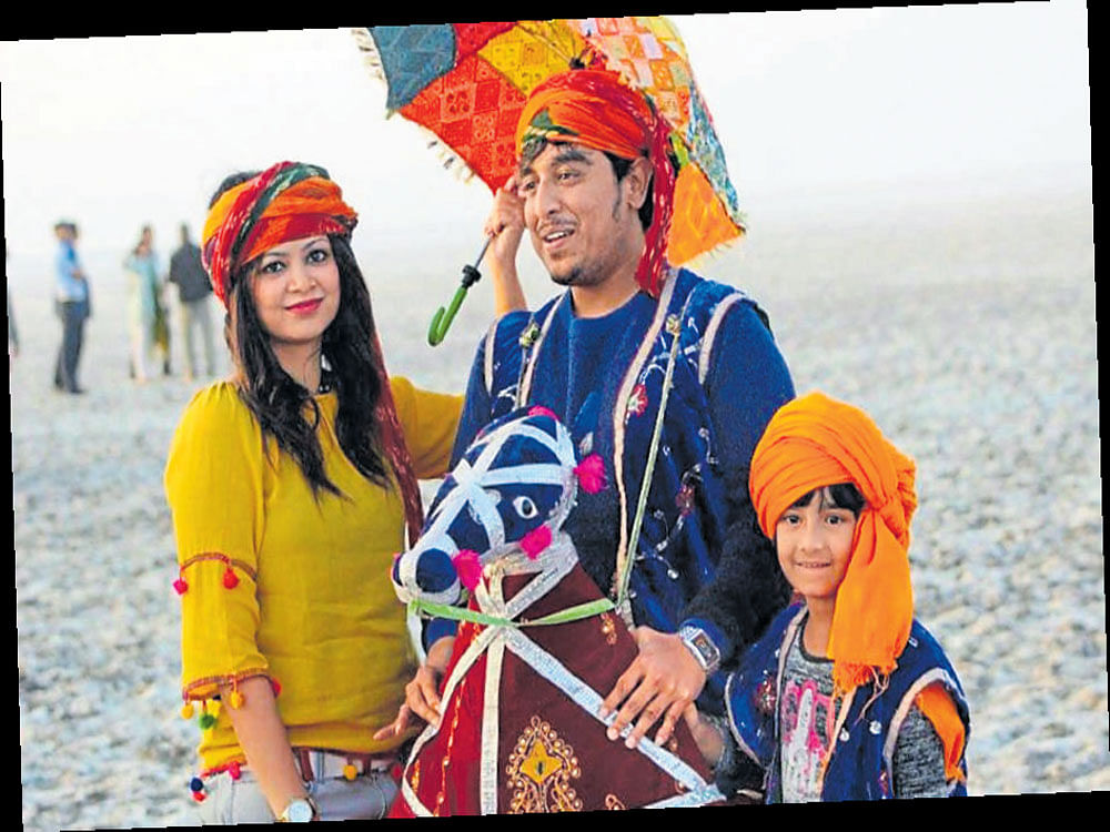 traditional mode The author, husband Sandeep and daughter Sana in the colourful Kutch attire.