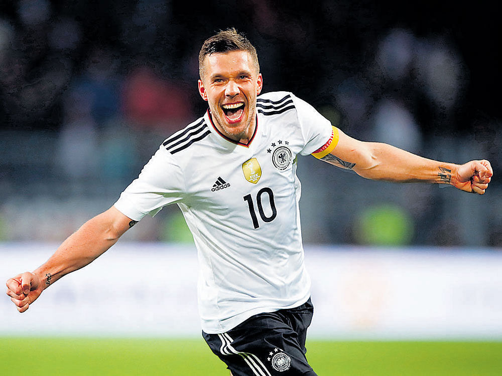 Last Hurrah!: Germany's Lukas Podolski celebrates his goal against England. reuters