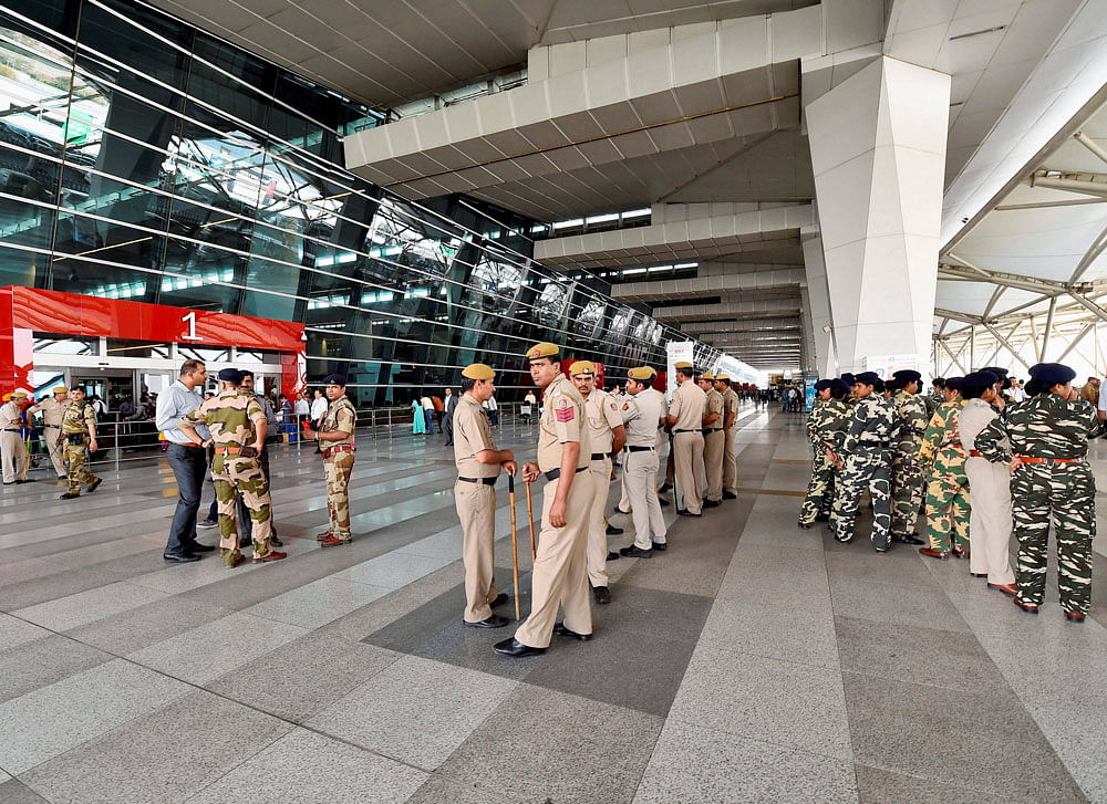 Security personnel stand guard at IGI airport where Shiv Sena MP Ravindra Gaikwad was about to arrive to catch a flight, in New Delhi on Friday. Fedration of Indian Airlines condemned Gaikwad's assualt on an Air India staff member. PTI Photo