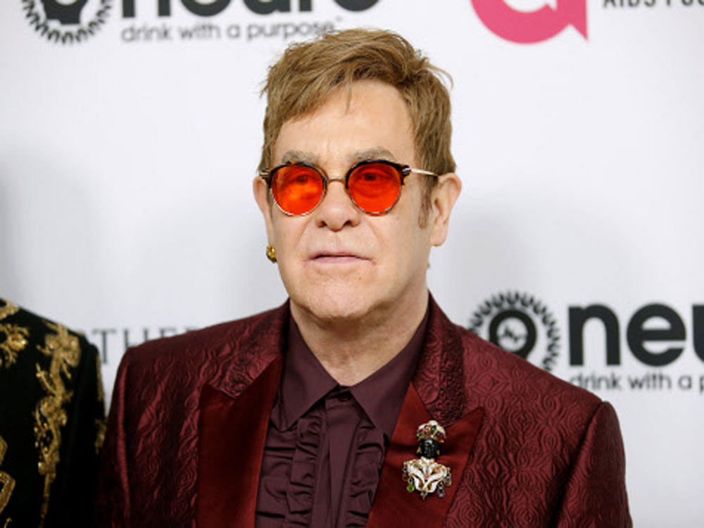 Singer Elton poses at his 70th Birthday and 50-Year Songwriting Partnership with Bernie Taupin benefiting the Elton John AIDS Foundation and the UCLA Hammer Museum at RED Studios Hollywood in Los Angeles. Reuters Photo