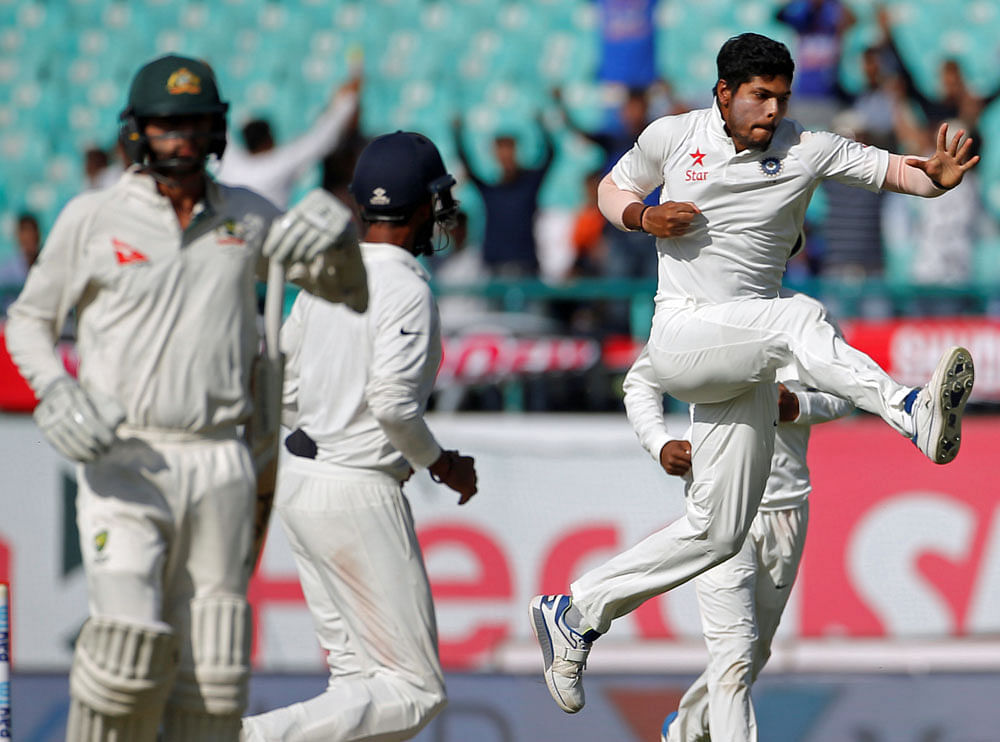 Pumped UP: Pacer Umesh Yadav is ecstatic after dismissing Nathan Lyon on Monday. REUTERS