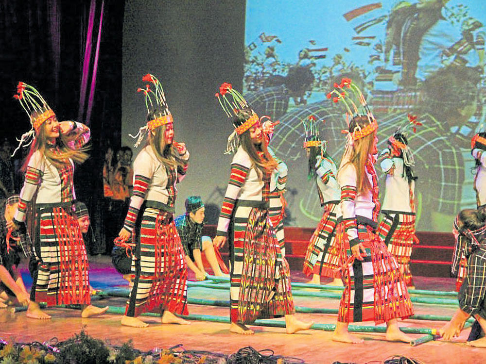 A traditional bamboo dance performance.