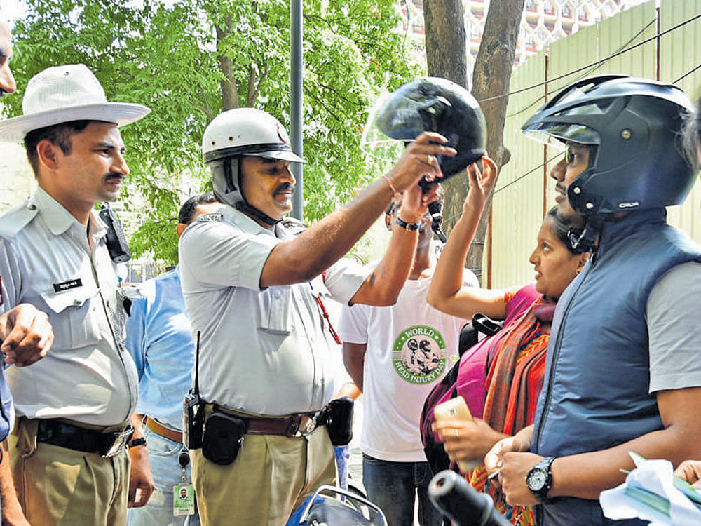 A senior police officer, who did not want to be named said, 'It was being observed that in the East division, the riders and pillion riders were taking the helmet rule lightly. On Thursday morning, we decided that a special drive will be carried out and within two hours 1,794 cases were registered. We also requested the motorists who were booked, to wear helmets and also make their pillion riders wear them.' File photo for representation