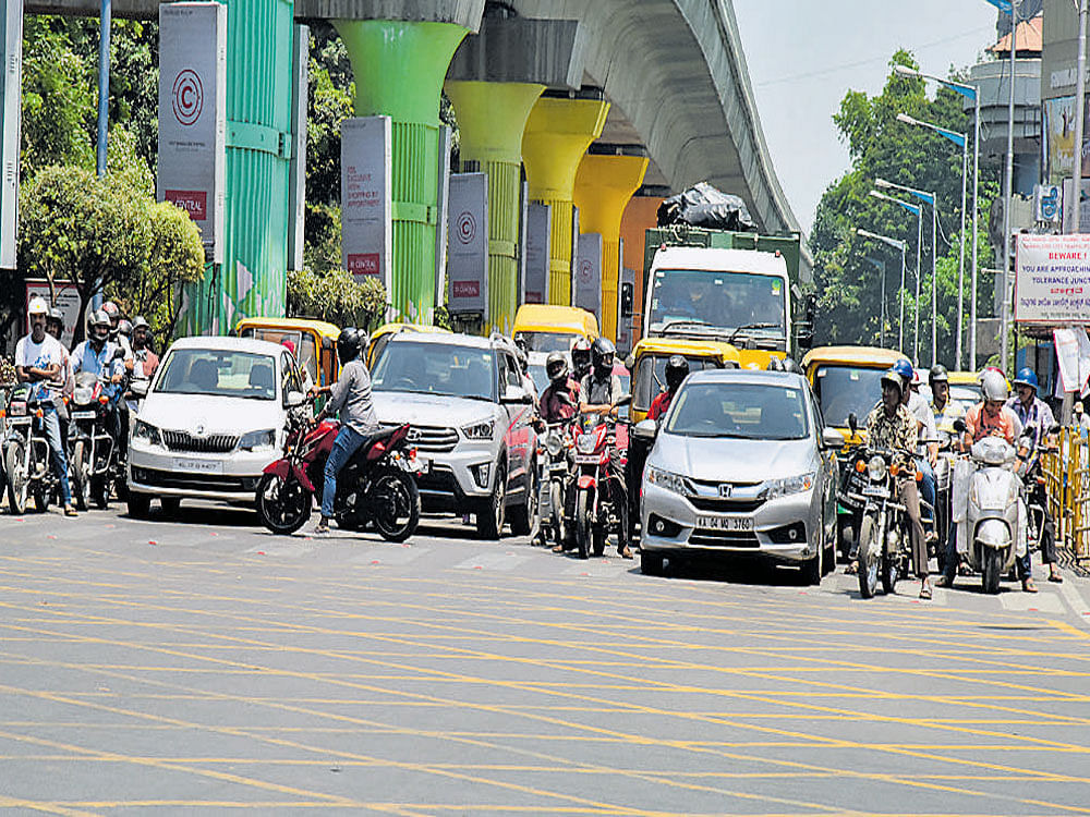 avoiding chaos The Bengaluru Traffic Police's introduction of yellow box junctions is seen as a useful step.  DH PHOTO&#8200;BY&#8200;B K&#8200;JANARDHAN