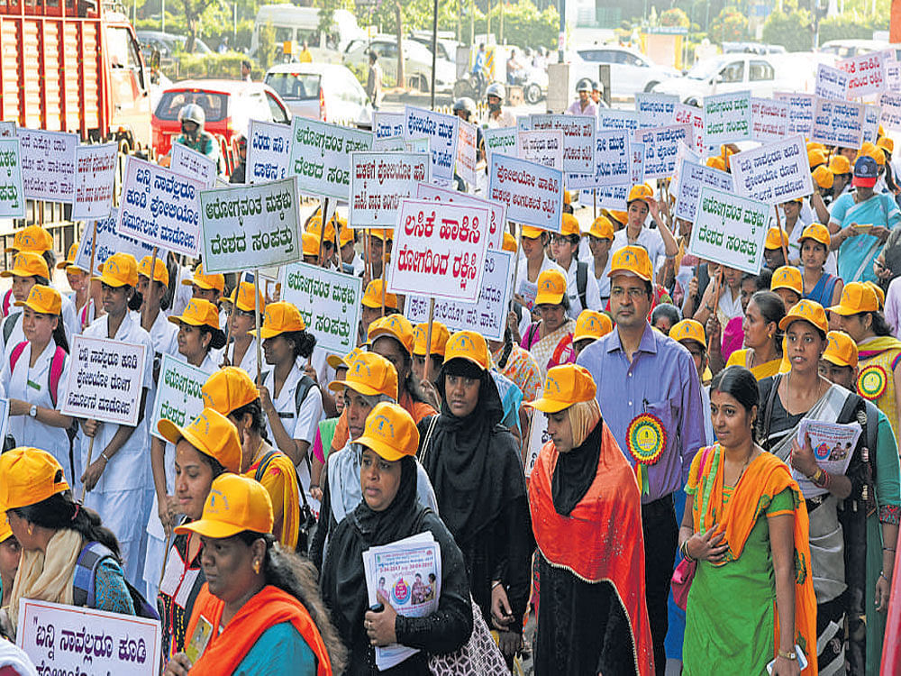 Nursing students and other organisations participate in the National Pulse Polio programme awareness rally organised by BBMP at MG Road in Bengaluru on Friday. DH Photo