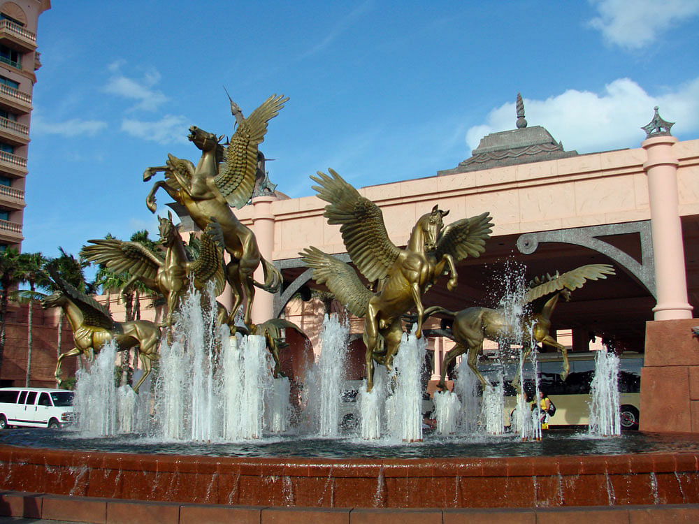 Pointing skyward: The bronze sculpture 'Flying Horses of Atlantis' & fountains in Nassau. Photo by author