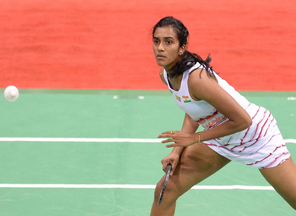 Delicate: India's PV Sindhu returns one during her win over Sung Ji Hyun of Korea in the semifinal on Saturday. PTI