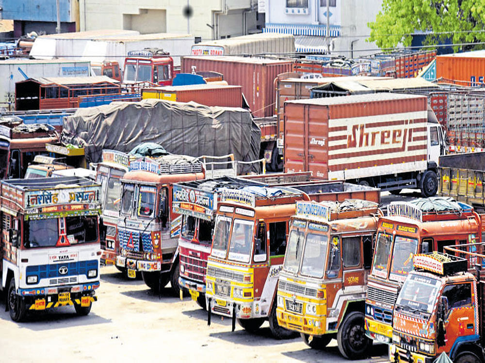 Trucks parked at Devaraj Urs Truck terminal on Monday. Truck operators have been on strike since April 1 opposing the hike in insurance premium. DH&#8200;Photo