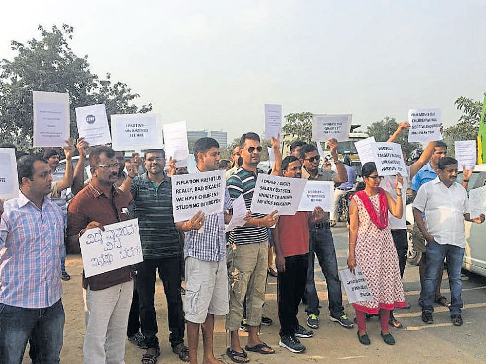 Parents of Vibgyor High, Kadugodi, held peaceful protests outside the school last month, demanding that the management give them an explanation for fee hike between 15%  and 25%. dh file photo