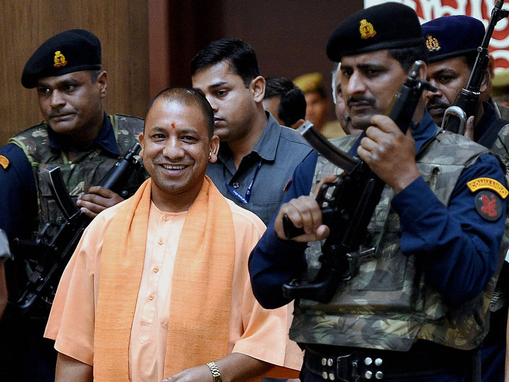 UP Chief Minister Yogi Adityanath coming out after the cabinet meeting at Lok Bhawan in Lucknow on Tuesday. PTI Photo