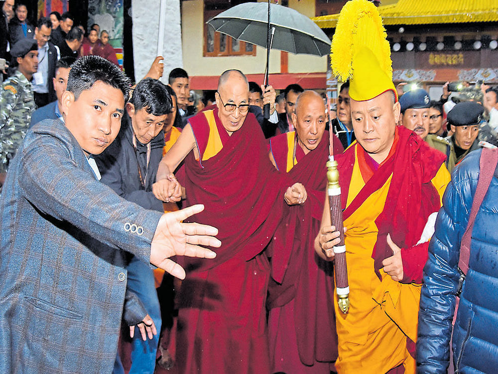 the wait ends: Tibetan spiritual leader the Dalai Lama arrives at the Thubchog Gatsel Ling Monastery in Bomdila, Arunachal Pradesh, on Tuesday. REUTERS