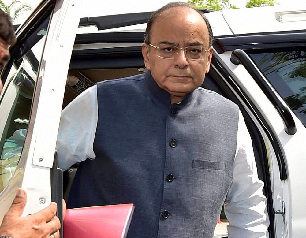 Finance Minister Arun Jaitley arrives at the Parliament during the budget session, in New Delhi on Wednesday. PTI Photo
