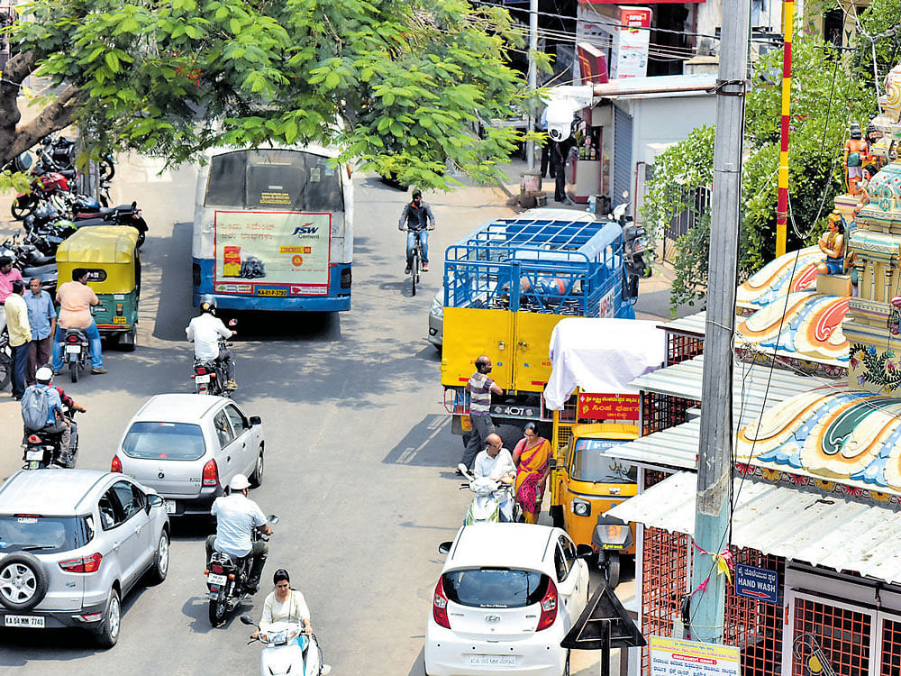 CCTV cameras like the one in Geddalahalli (top) and Bhoopasandra (left) will be installed across the city. DH PHOTO BY B K JANARDHAN