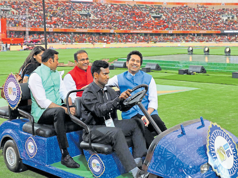 LegendsVVS Laxman, Virender Sehwag and Sachin Tendulkar enjoy a cart ride after being felicitated prior to the start offirst match of IPL-10 in Hyderabad on Wednesday. Courtesy: IPL Media
