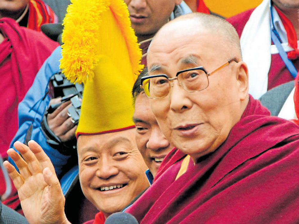 Tibetan spiritual leader Dalai Lama interacts with the media after a discourse at Bomdila in West Kameng district of Arunachal Pradesh on Wednesday. PTI