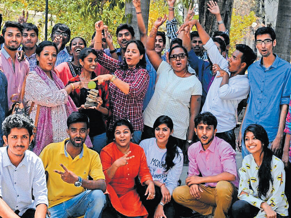 The students of the college in a celebratory mood.