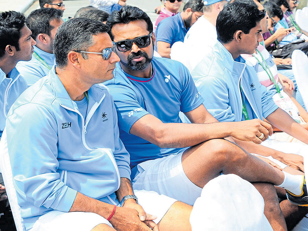 India's Leander Paes (right) with coach Zeeshan Ali during theDavis Cup drawceremony. DH PHOTO/ SRIKANTA SHARMA R