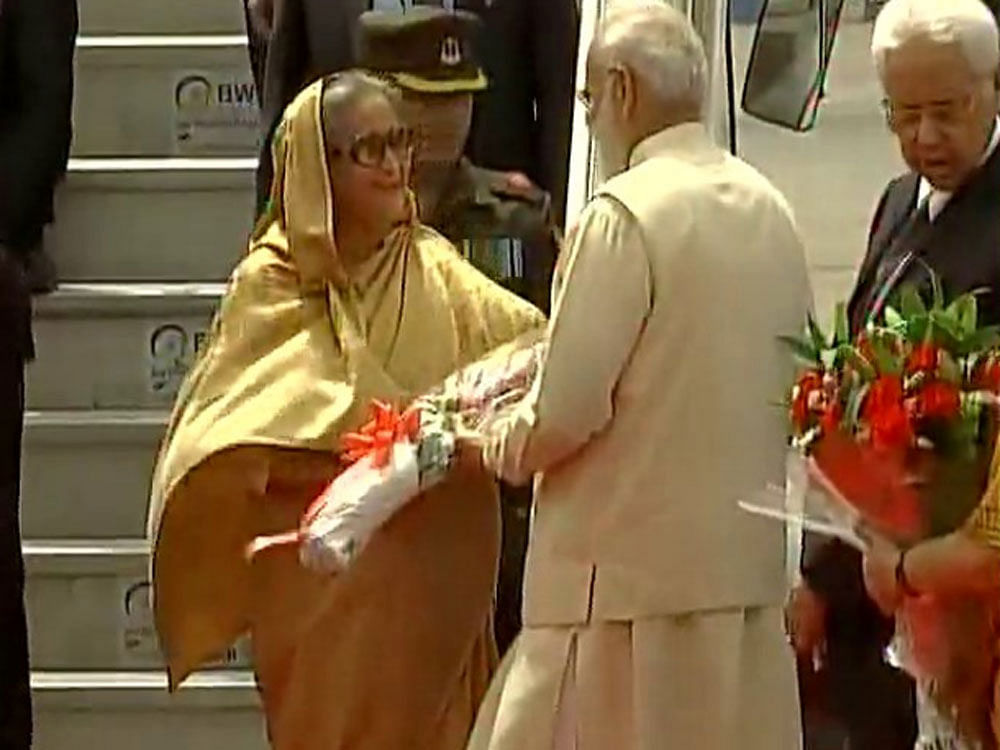 Prime Minister Narendra Modi receives his Bangladesh PM Sheikh Hasina in Delhi. Picture courtesy ANI