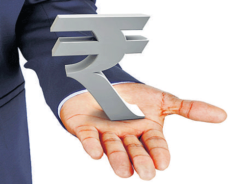 A highly volatile dollar overseas along with uncertainties surrounding US President Donald Trump's fiscal policy helped the rupee close higher too. File Photo