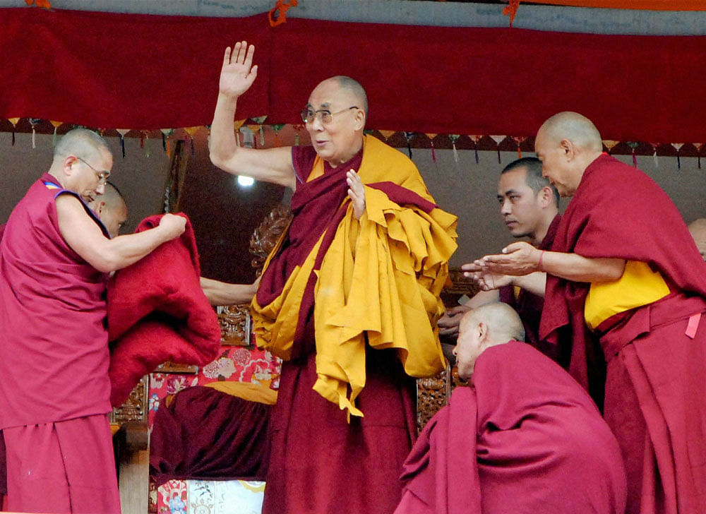 Stormy tour: The Dalai Lama arrives at Dirang monastery in Arunachal Pradesh on Thursday. Each day, as he comes closer to the holy site of Tawang, China presses India more forcefully to stop his progress, its warnings growing increasingly ominous. PTI
