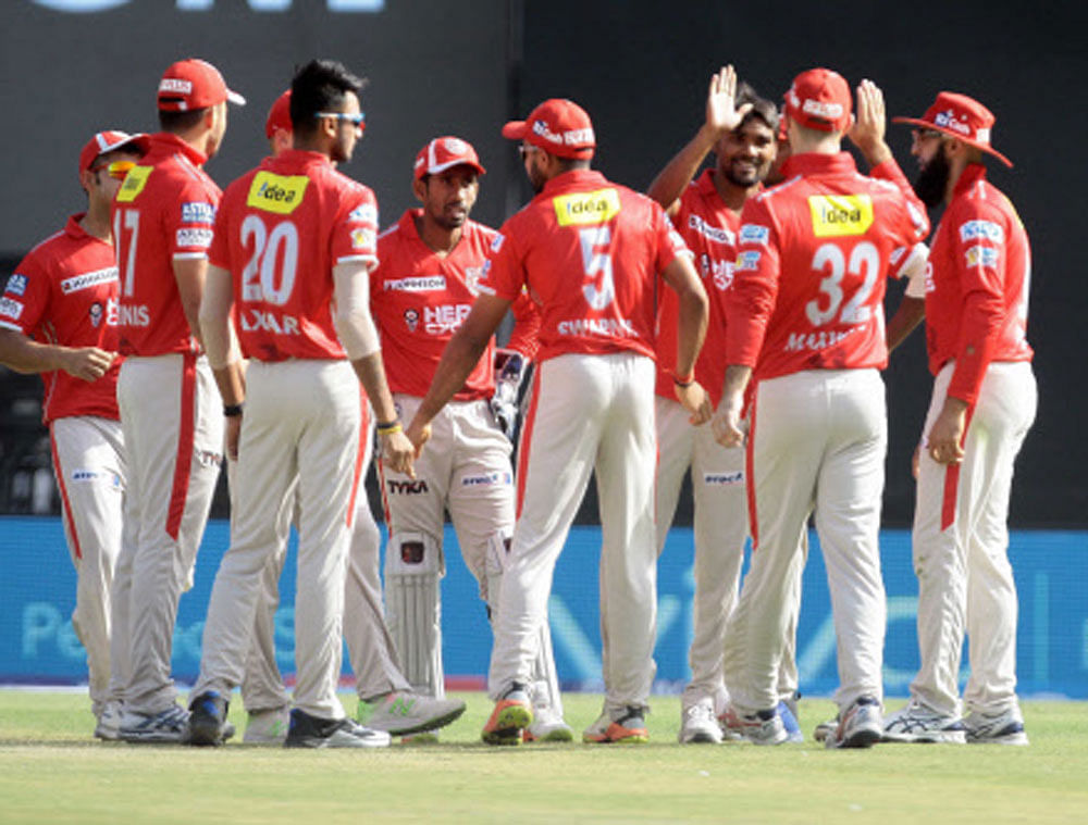 Kings XI Punjab players celebrates the wicket of Mayank Agarwal of RSP during an IPL match in Indore on Saturday. PTI Photo
