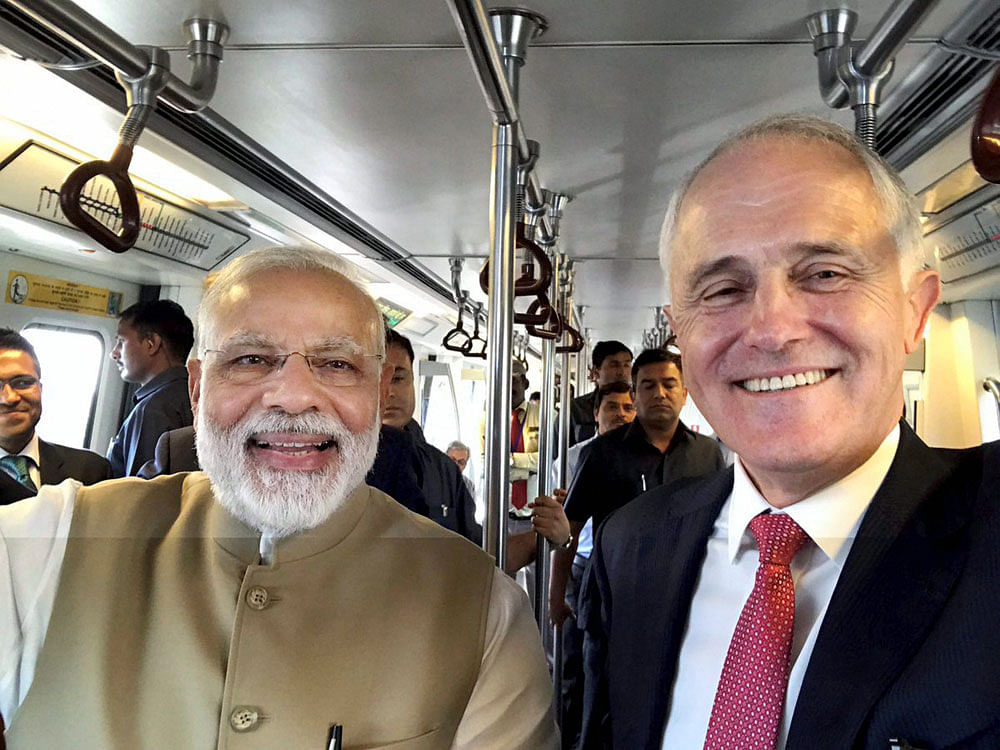 The leaders reached the Mandi House station around 4 PM where an official briefed Turnbull about the 213-km, and expanding, metro network. PTI photo