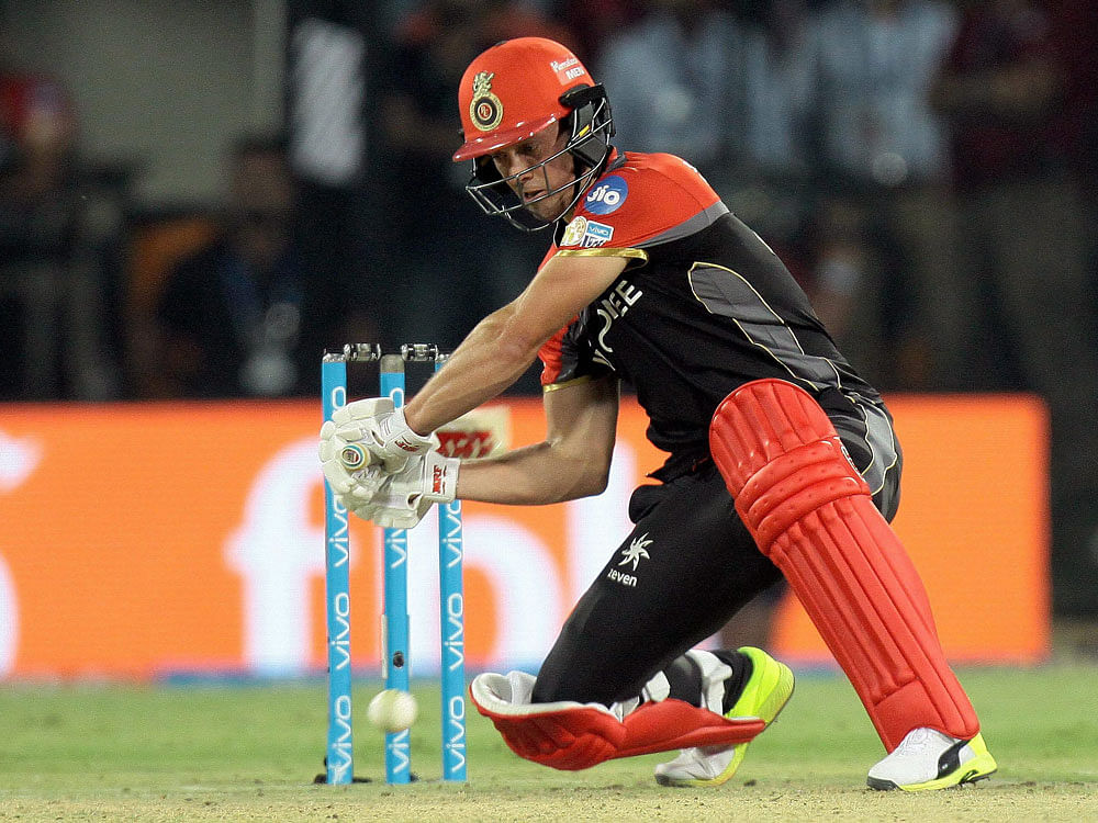 blistering knock: Royal Challengers Bangalore's AB de Villiers en route to his unbeaten 89 off 46 balls against Kings XI Punjab at the Holkar Stadium in Indore on Monday. PTI