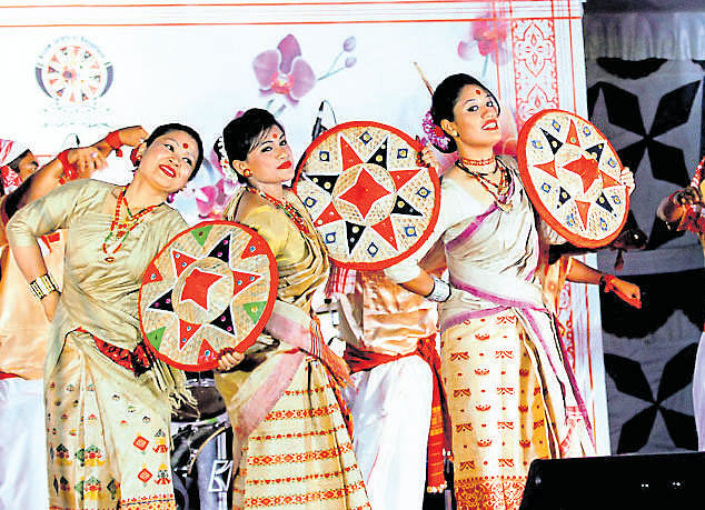 colourful display Sharmistha Gogoi (third from left) with the members of 'Assam  Society of Bangalore'.