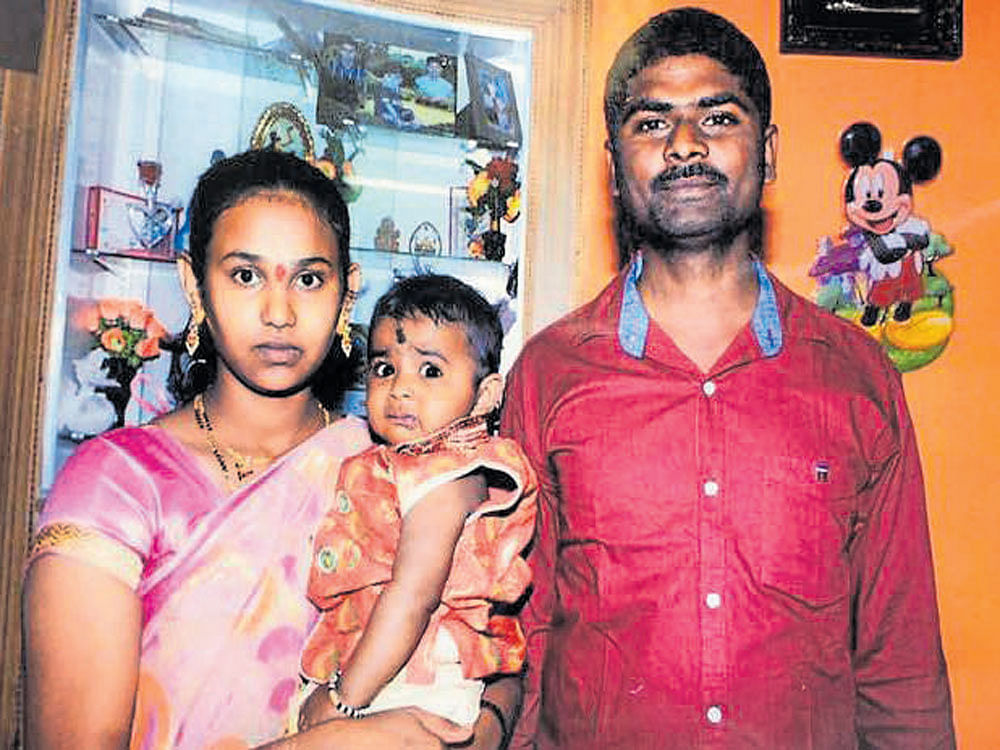 Mithun Kumar with wife Roja and son Gagan.
