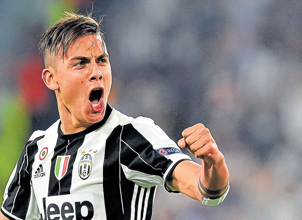 NEXT BEST THING: Juventus' young Argentine star Paulo Dybala struck two goals against Lionel Messi's Barcelona to further enhance his stature. AFP